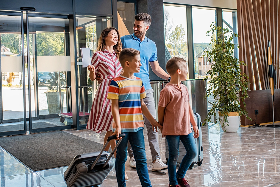 Family checking in at a hotel