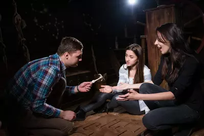 people playing an escape room