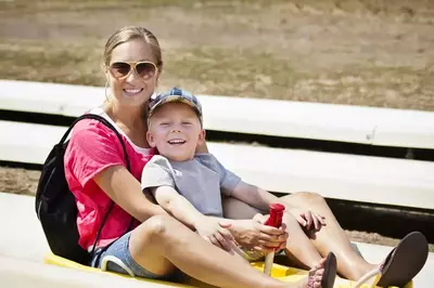 happy family on alpine coaster