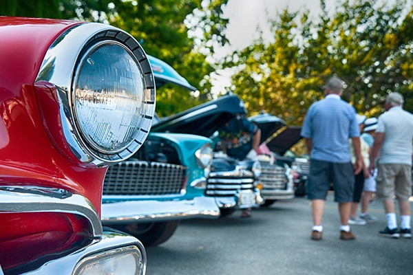 Line of old cars at car show